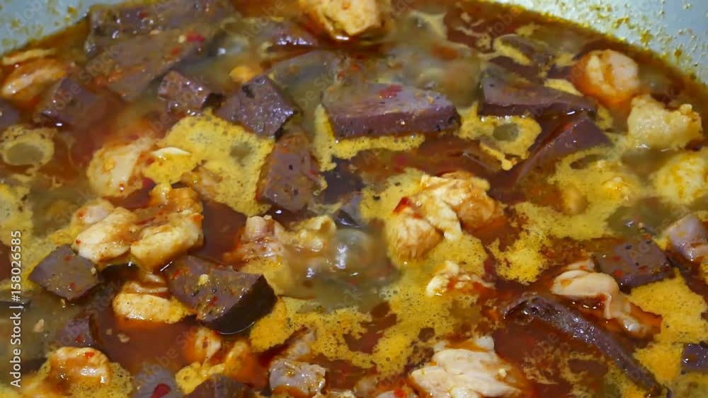 Steps to make a chicken spicy curry in thai style. Contains chicken, chilli, Curry, Kaffir lime leaves stir until boiling, add color with red pepper. Steps to make a chicken spicy curry in thai style. Contains chicken, chilli, Curry, Kaffir lime leaves stir until boiling, add color with red pepper.