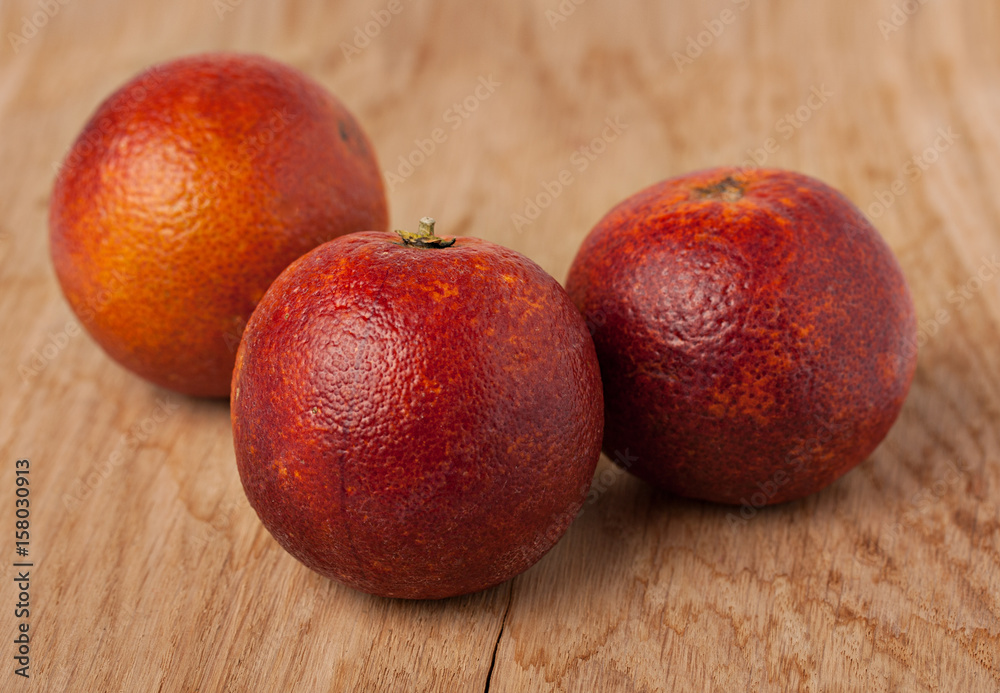 Oranges over a wooden background Oranges over a wooden background