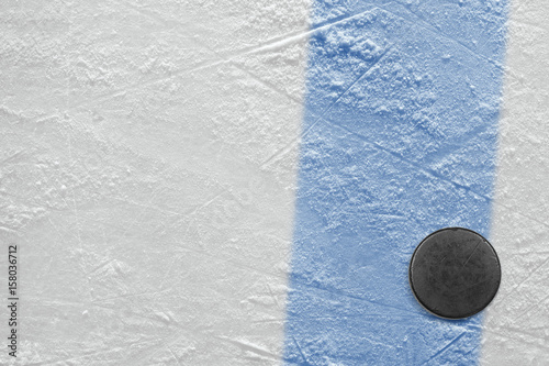 Hockey puck on the blue line