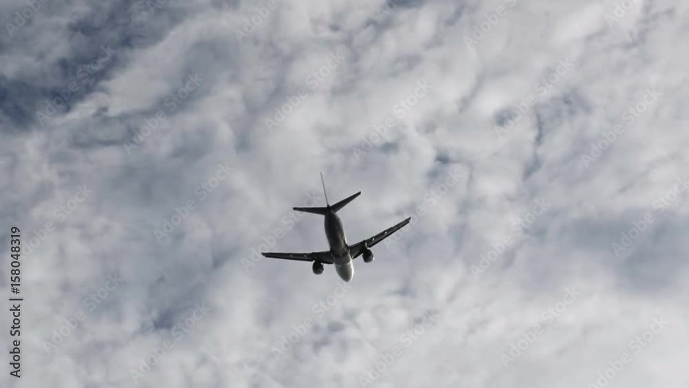 Passenger airplane takeing off on a cloudy sky Passenger airplane takeing off on a cloudy sky