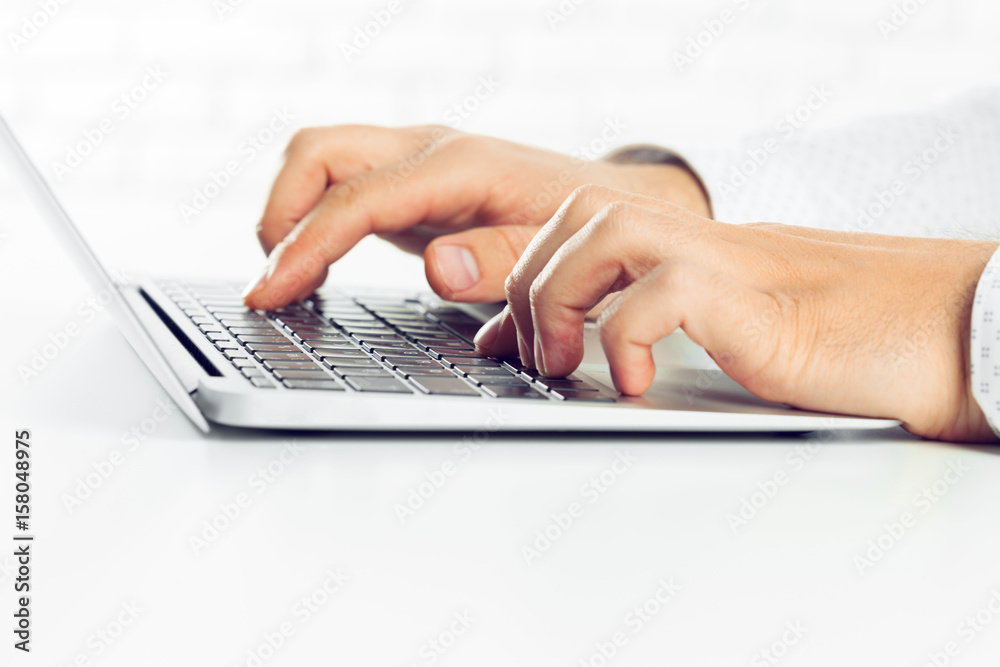 Businessman working on laptop. On the table Businessman working on laptop. On the table