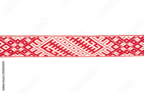 National symbols of Latvia - Lielvardes (name of the place in Latvia) traditional belt with historical ornaments. Belt of Lielvarde is most magnificent Latvia’s ethnographic belt 