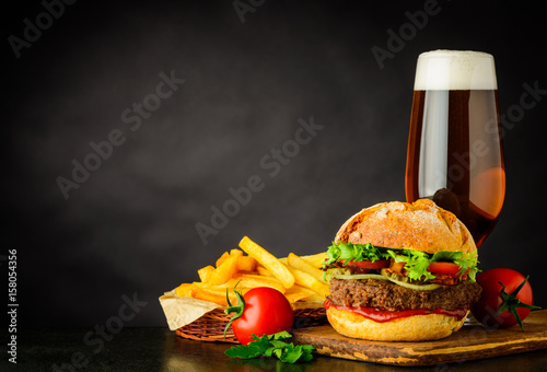 Beer with Burger and French Fries on Copy Space