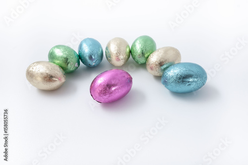 Multi-colored easter chocolate eggs in colored foil