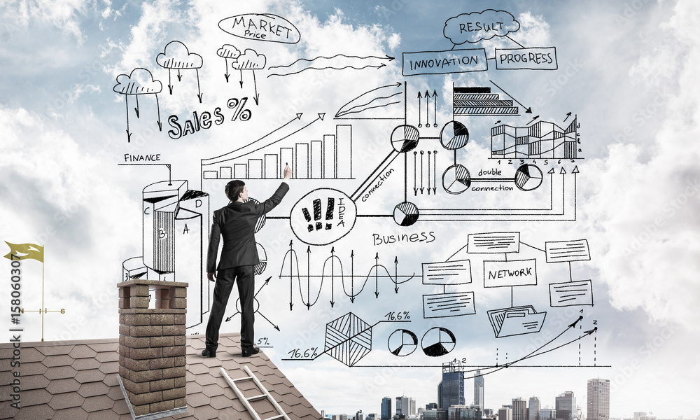 Rear view of businessman on house roof drawing his new business Rear view of businessman on house roof drawing his new business