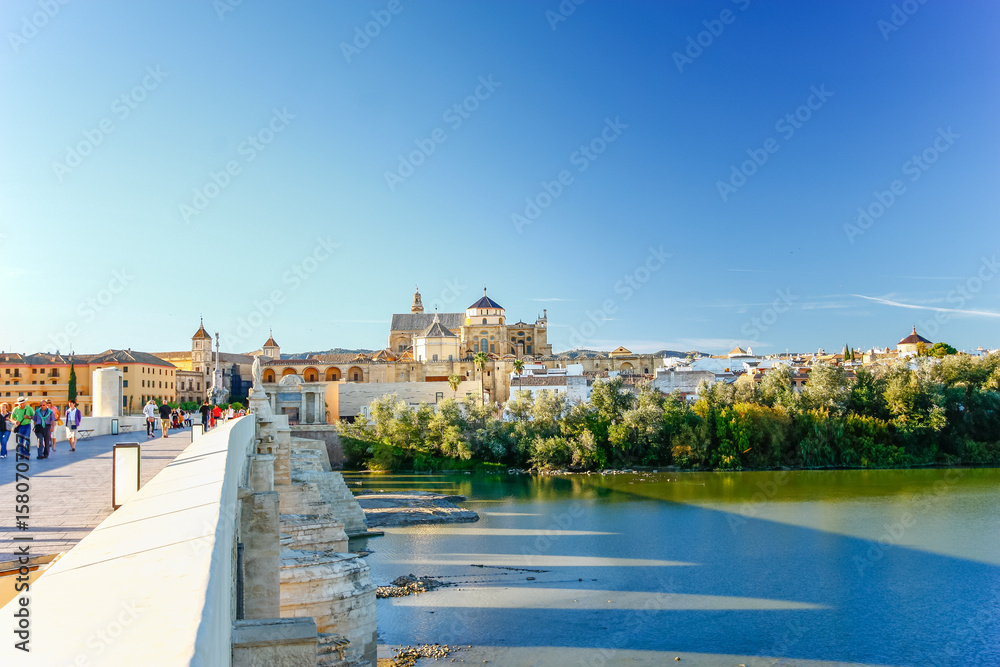 CORDOBA, SPAIN - OCTOBER 15,2012 : Great Mosque with Roman Bridge and Guadalquivir river,  Cordoba,  Spain