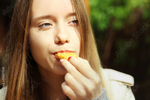  girl is eating nuggets