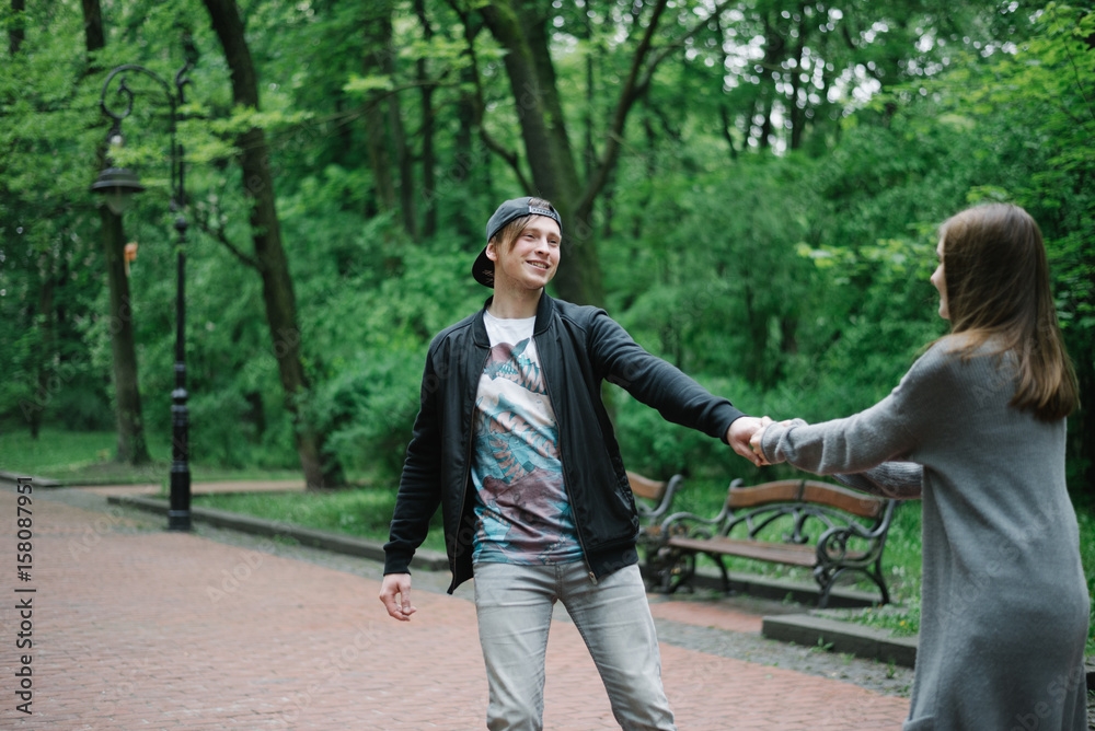 lovely cople running and play in the park lovely cople running and play in the park