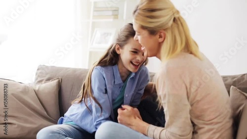 happy family having fun and tickling at home