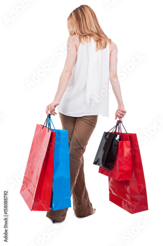 Full body of sexy customer with shopping bags