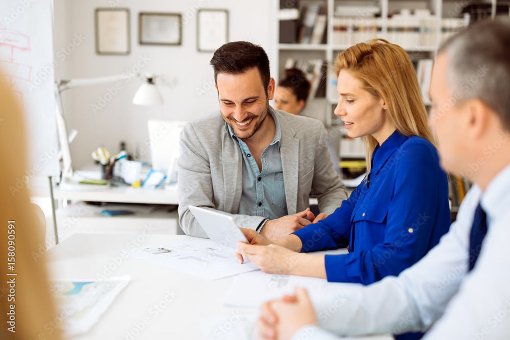 Businesspeople collaborating in office