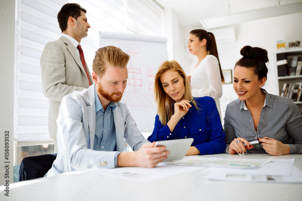 Business people having a board meeting Business people having a board meeting
