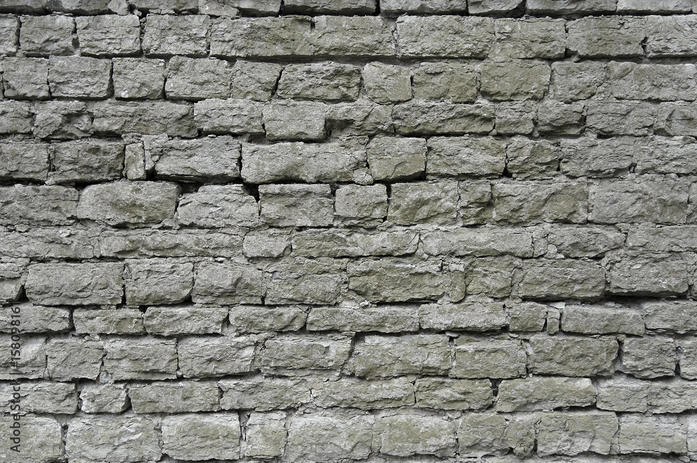 Old grey stone wall background texture Old grey stone wall background texture