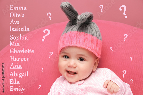 Cute little baby sitting on...