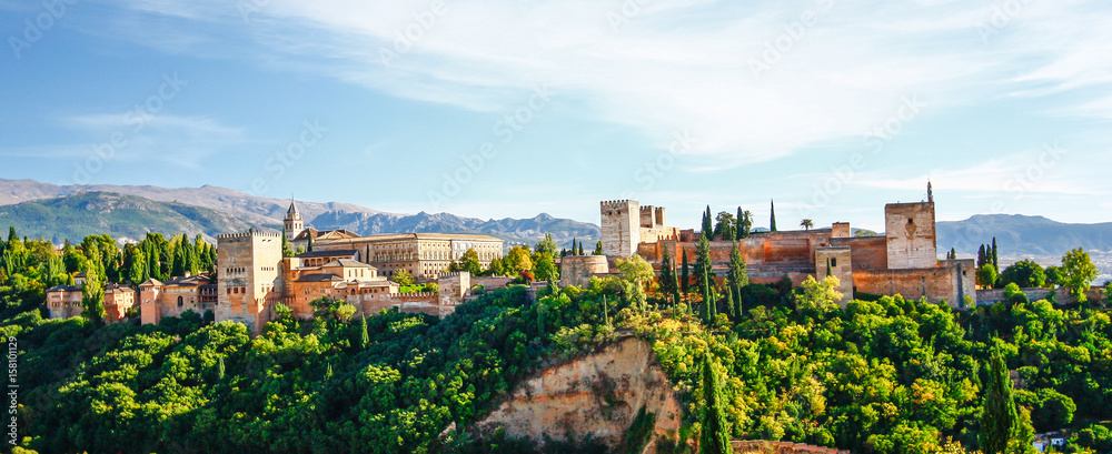 Panorama view of Alhambra palace in sunny day, Granada, Spain