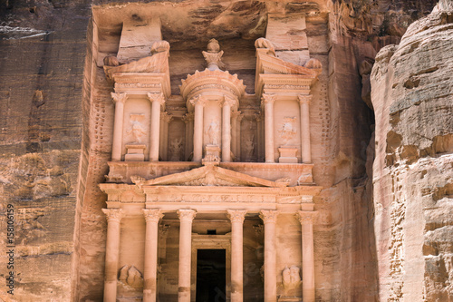 Front view of facade of Al-Khazneh temple - The Treasury - in Arab Nabatean Kingdom city of Petra, Jordan