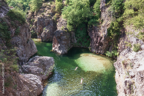 swimmers in the river Ardeche near the devil s bridge