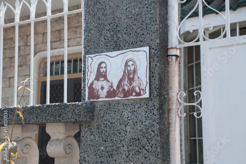 The picture at the entrance to the house of Jesus Christ and mother of God. Philippines. Manila photo