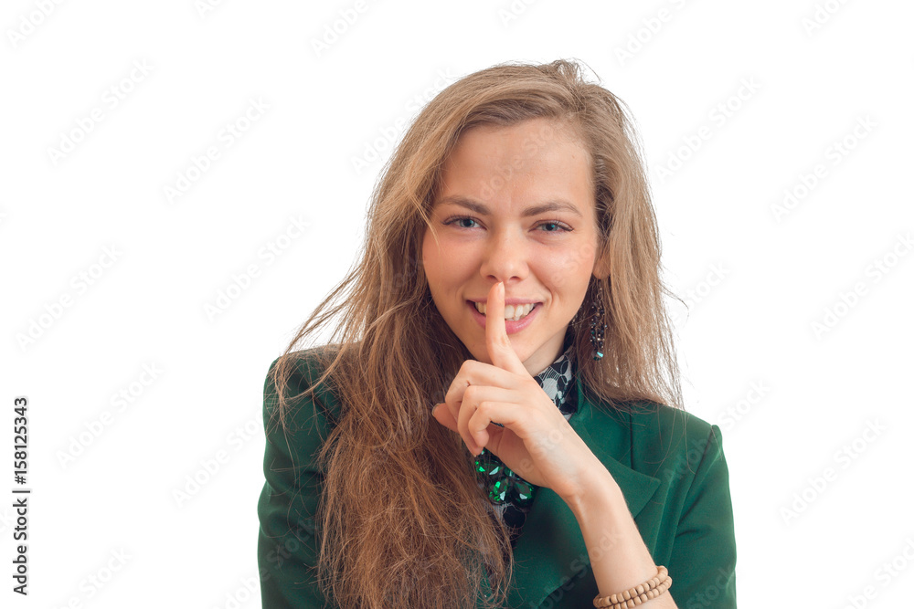 horizontal portrait of young chic blonde which shows a finger near the mouth gesture quietly horizontal portrait of young chic blonde which shows a finger near the mouth gesture quietly