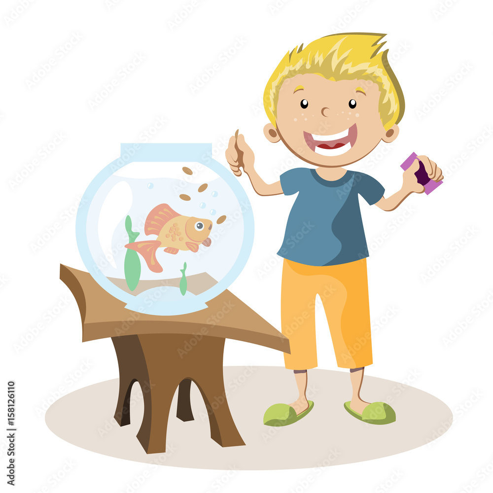 Boy feeding little fish in their fish tank