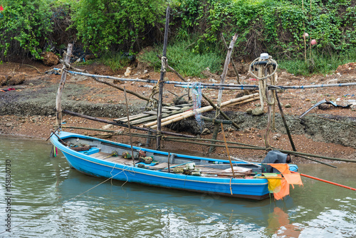Wallpaper Mural The small fishing boat parked in a small canal. Torontodigital.ca