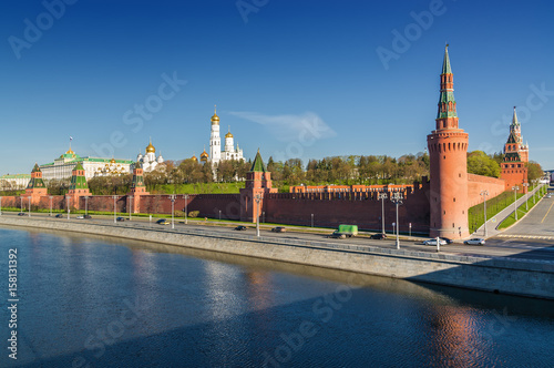 Morning view of Bolshoy Kamenny Bridge over Moskva River, embankments, Kremlin Towers, Cathedral of Christ the Saviour in Moscow, Russia.