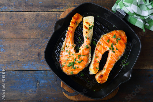 Grilled Salmon steak on a griddle