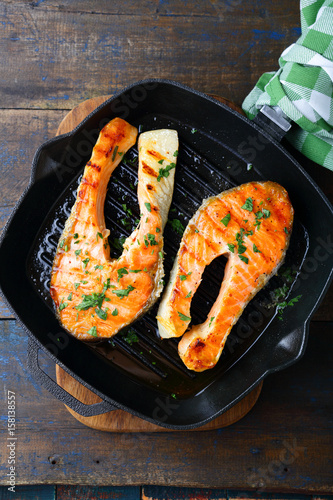 Grilled Red Fish steak on a griddle