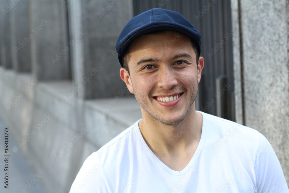 Hip multiracial male smiling with copy space Hip multiracial male smiling with copy space