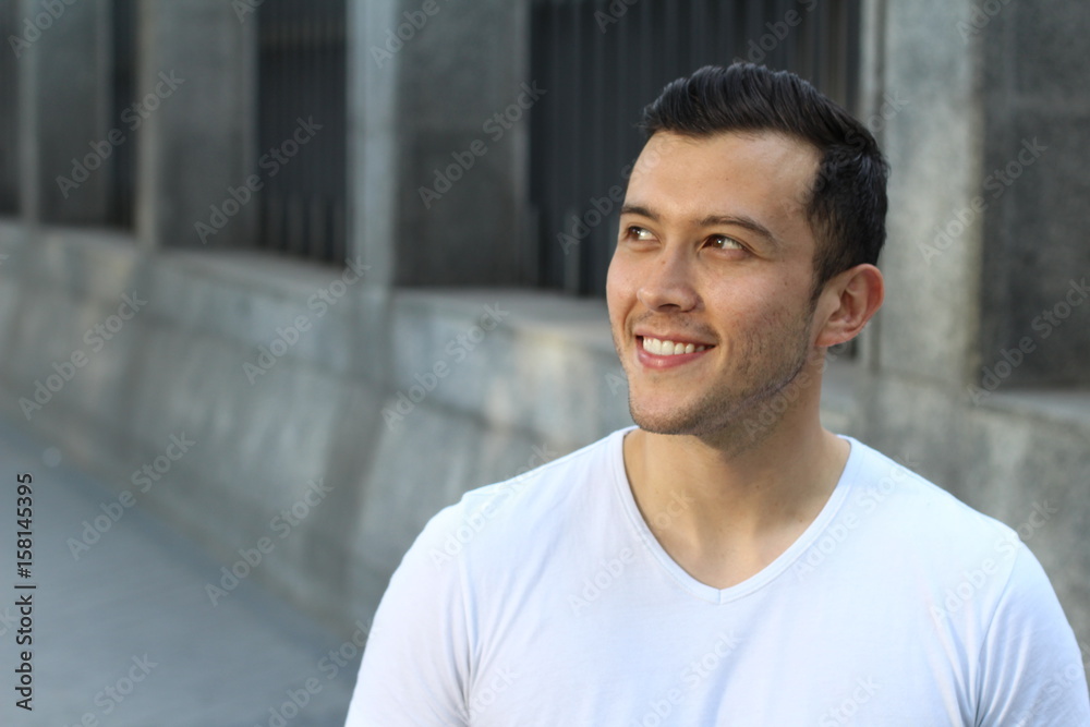 Joyful ethnic male smiling isolate with copy space Joyful ethnic male smiling isolate with copy space