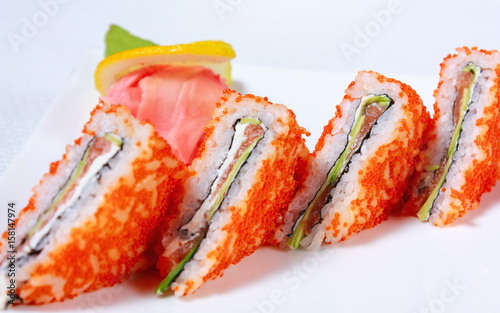 Sushi sandwiches with salmon and caviar tobiko