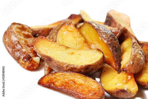 Potato wedges roasted in their skins
