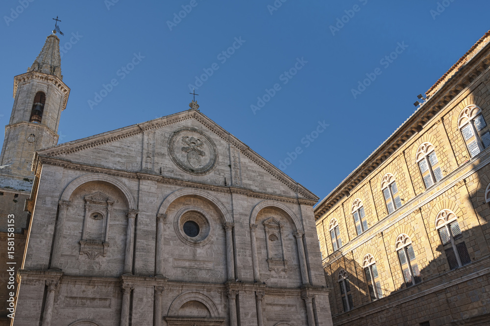 PIENZA, TUSCANY-ITALY,  OCTOBER 30, 2017: Old town of Pienza, Tuscany, Italy. Historic Cathedral in the city center on Plaza de Pio II.