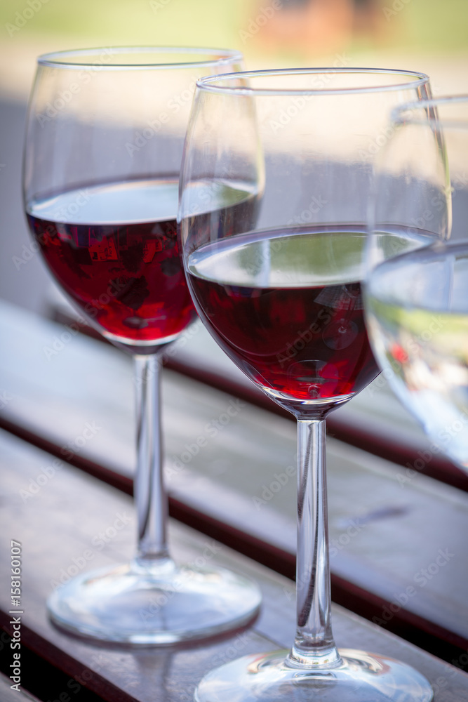 Glasses of Red and White Wine Close Up Glasses of Red and White Wine Close Up