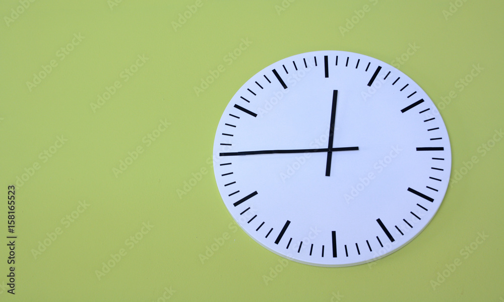 Isolated clock/Wall clock with green background Isolated clock/Wall clock with green background