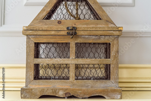 Close up vintage wooden decorative birdcage
