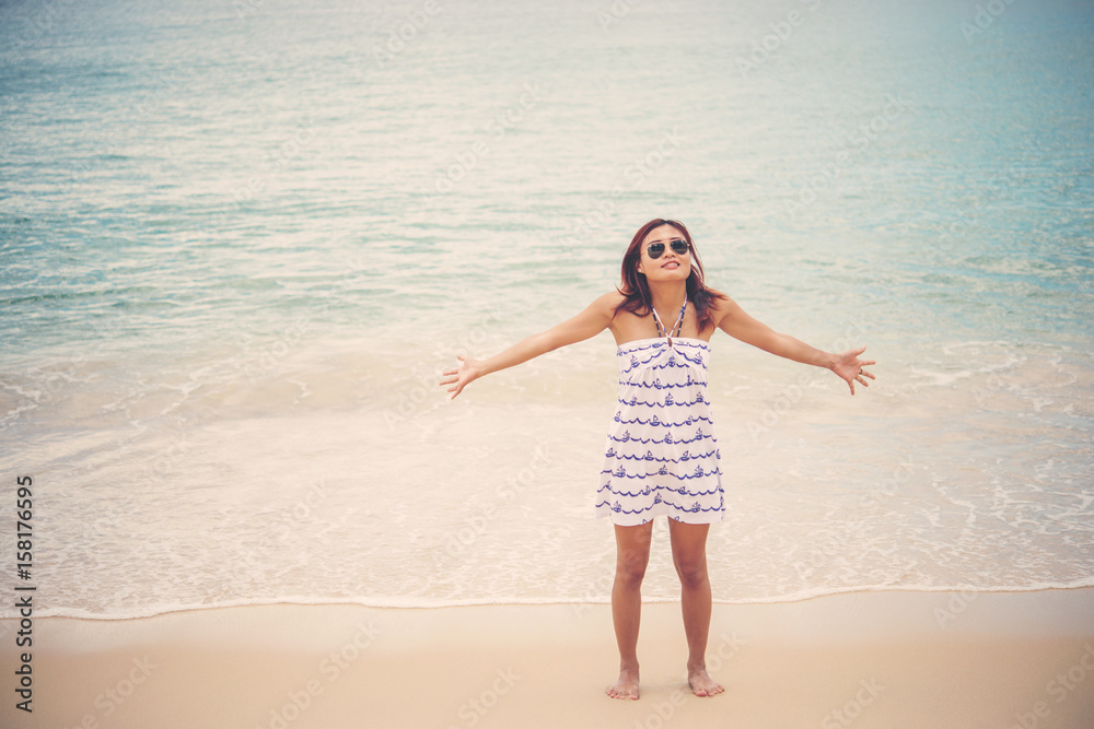 Young woman be happy and refreshing on the beach.