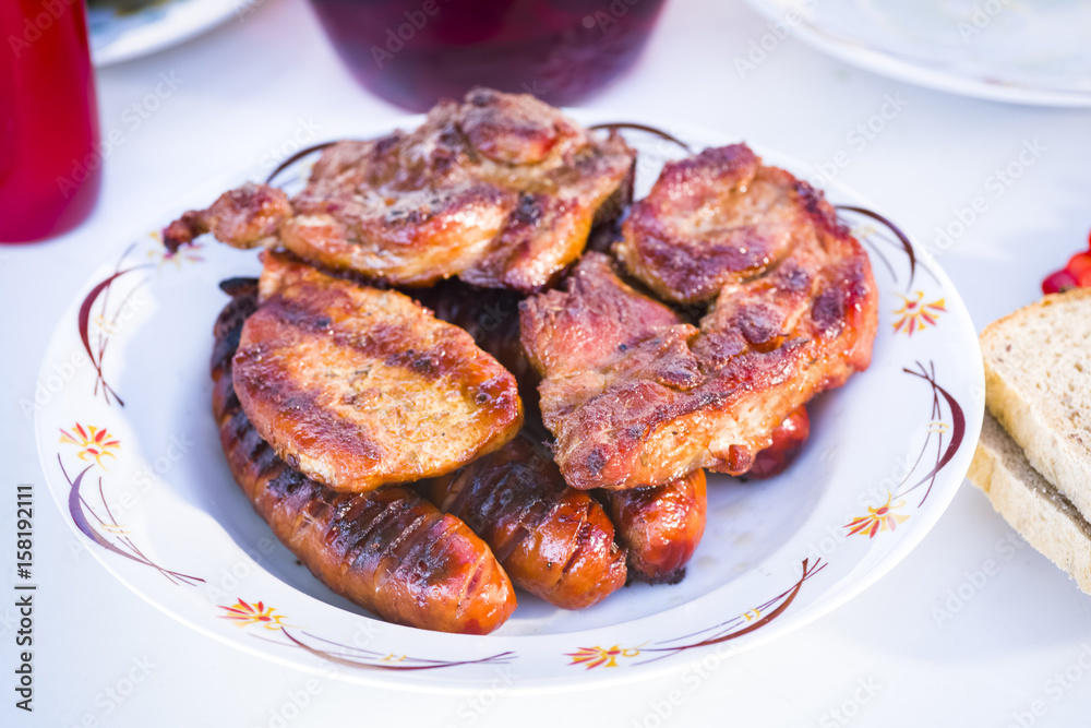 Grilled meat with bread and seasonings Grilled meat with bread and seasonings