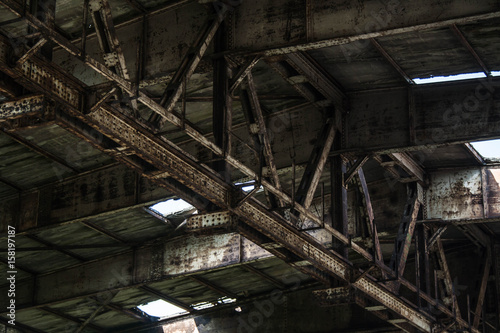 Part of old abandoned rusty building, dark creepy warehouse, dirty and broken © shadowsdance