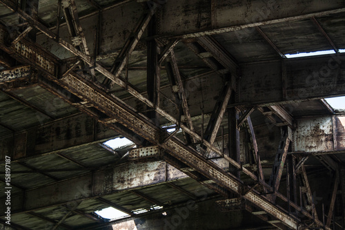 Part of old abandoned rusty building, dark creepy warehouse, dirty and broken