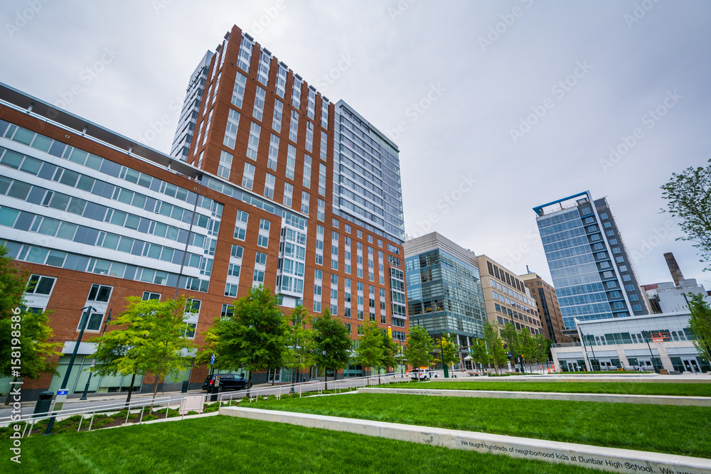 Modern buildings and Eager Park, in Baltimore, Maryland.