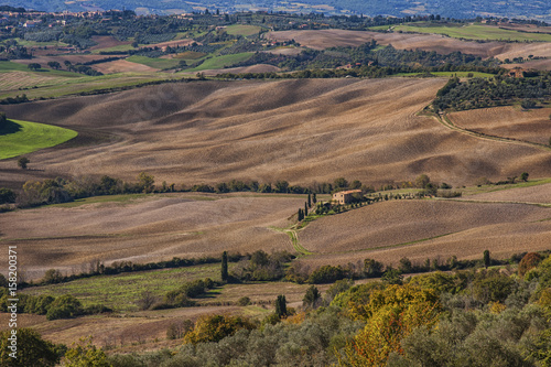 Pienza - Tuscany/Italy, October 30, 2016: Scenic Tuscany landscape with rolling hills and valleys in autumn, near Pienza - Val D'Orcia, Italy 