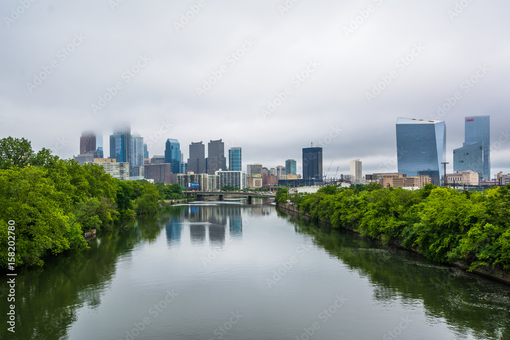 Foggy view of the Philadelphia skyline and Schuylkill River in Philadelphia, Pennsylvania.