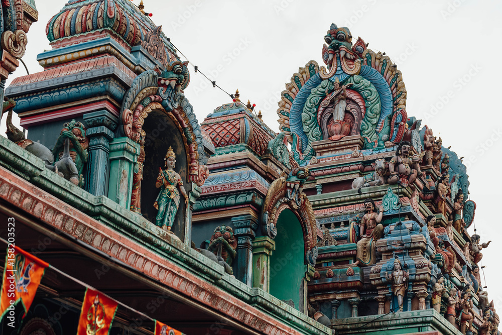 Obraz premium Sri Aruloli Thirumurugan (Penang Hill Hindu Temple) at evening from Penang Hill at George Town. Penang, Malaysia.