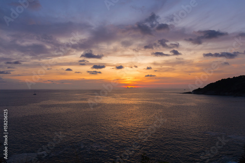 Colorful dramatic sky with cloud at sunset or twilight time.Sky with sun background at Promthep Cape Phuket Thailand