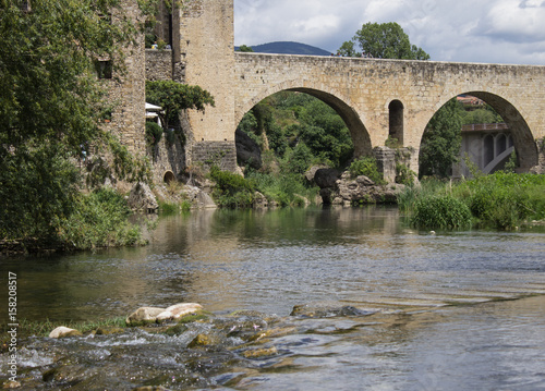 Bridge in the city-the castle of Besalú (bottom view, with the creek) © Mariia