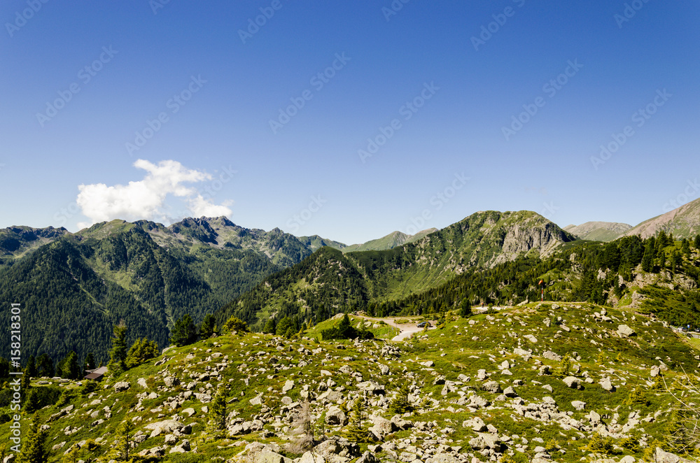 alps view during summer, scenic landscape of italian alps during summer with glacial lake