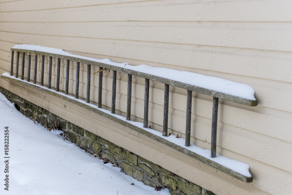 Obraz premium ladder hanging on building