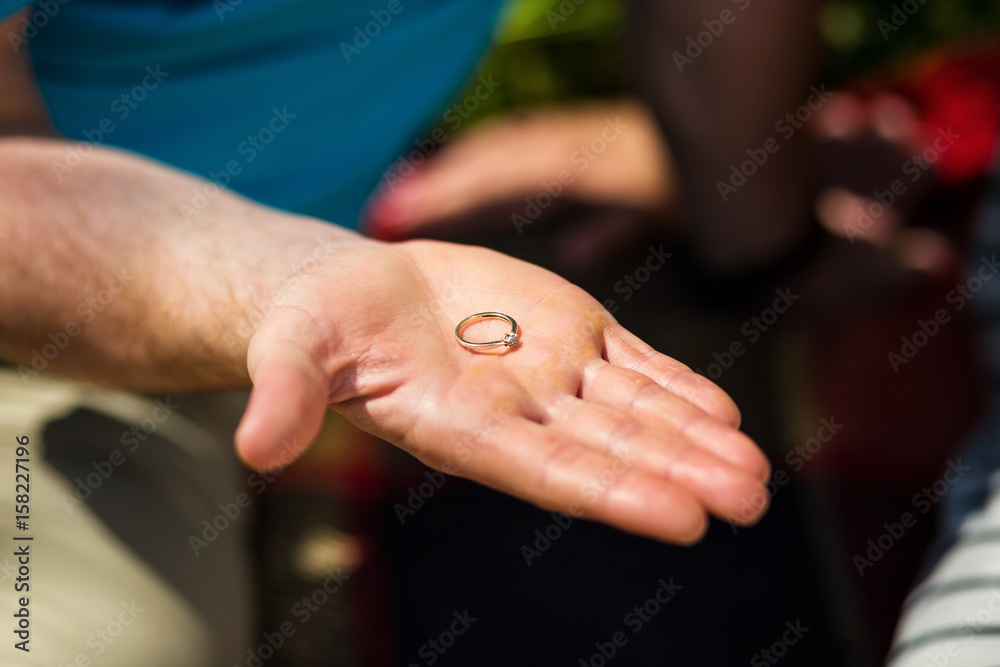 Premium Photo | Man giving wedding ring to her wife
