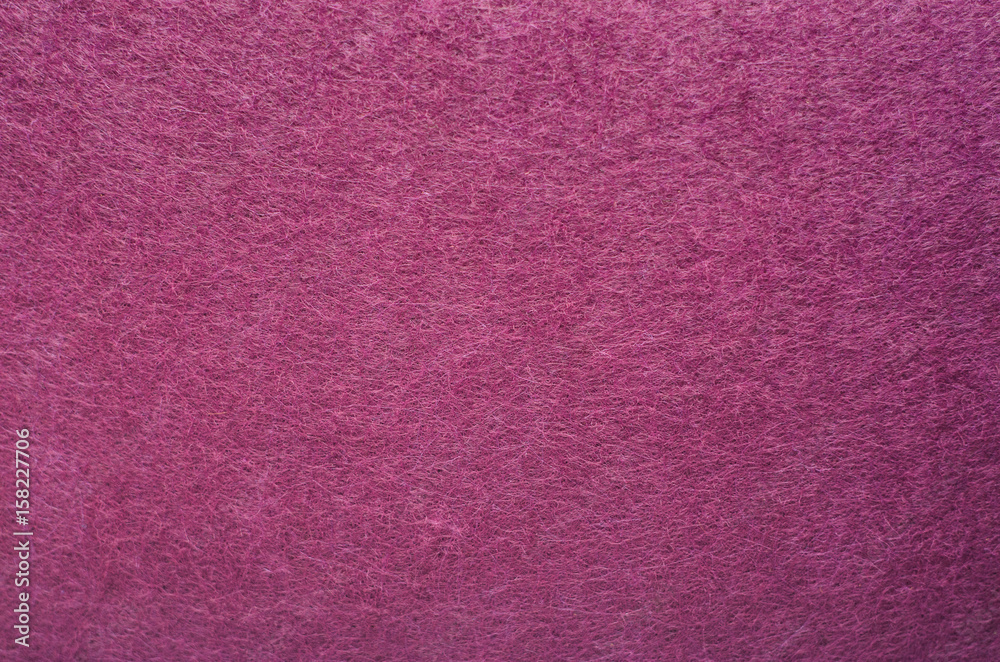Fototapeta premium Purple Color Felt Texture Background. Fiber texture of felt close-up